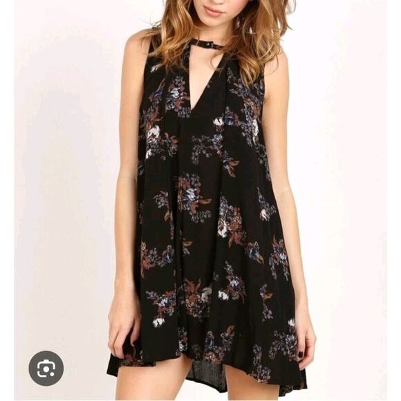 Free People Dresses & Skirts - Free People Black Floral Boho Sleeveless Flowy Swing Mini Dress Size Medium